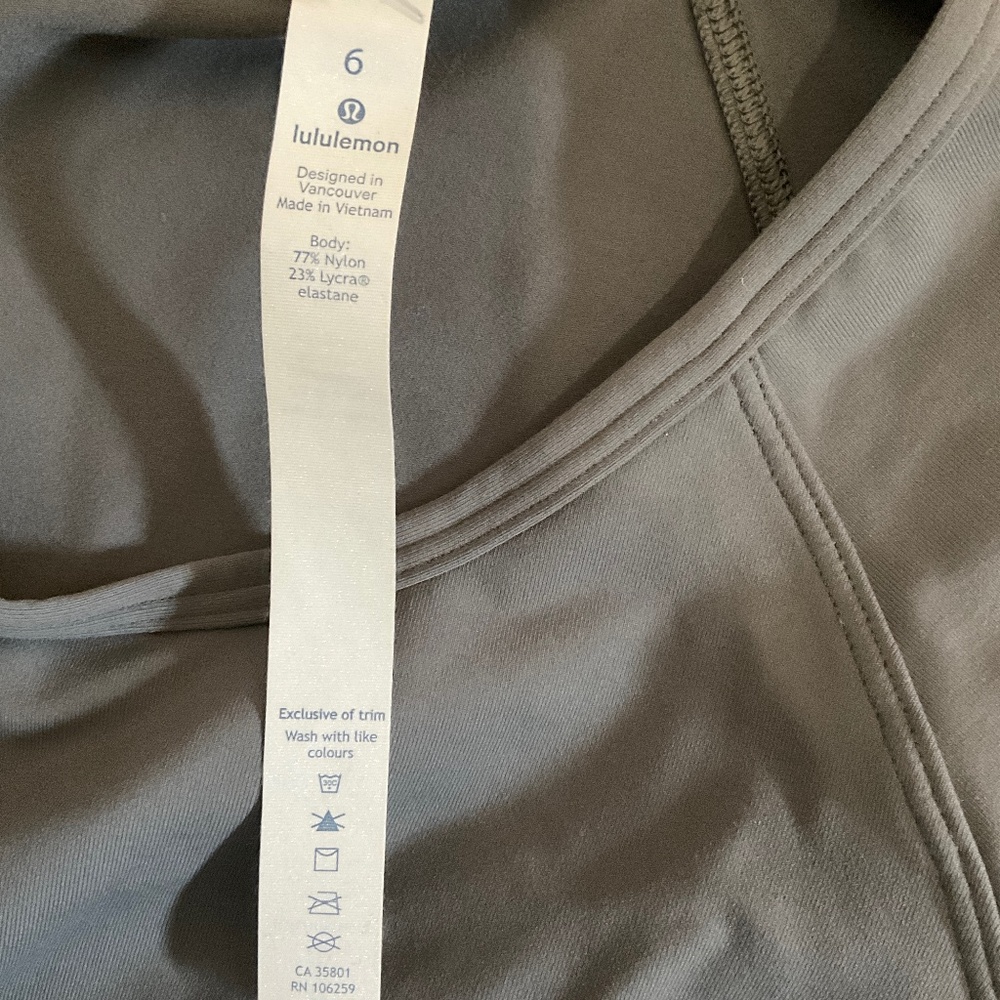 LULULEMON  Long Sleeve Gray Top/ Lululemon size 6 with shoulder ruffle